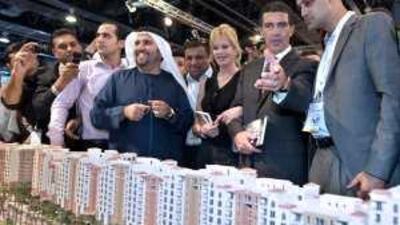 Spanish actor Antonio Banderas looks t a scale model at Hydra Properties showroom during last years' Cityscape.