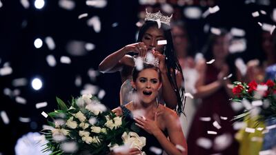 Biochemist Camille Schrier reacts as she is crowned Miss America in Uncasville, Connecticut.. AP Photo