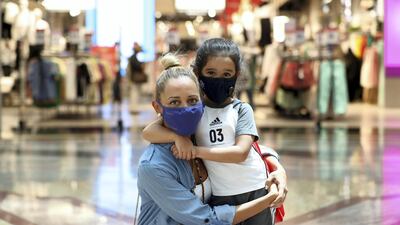 Dorsai Khaghani says she spent hundreds of dirhams on colourful face masks for her five-year-old daughter Karla. Chris Whiteoak / The National