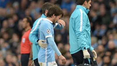 David Silva is helped off the pitch during the Uefa Champions League semi-final first leg when he incurred the injury. Oli Scarff / AFP