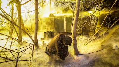 A Ukrainian serviceman fires a field gun at Russian positions in Donetsk. A former Nato official has warned that the Greenland debate must not divert support from Ukraine. EPA