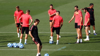 Real Madrid manager Julen Lopetegui, front, takes part in training ahead of the Uefa Champions League match against Roma. Reuters
