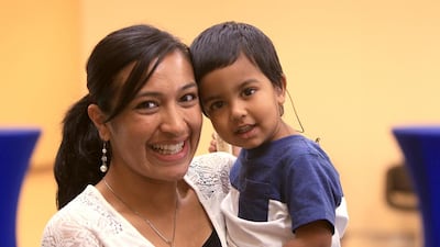 Anisah Ismail, the mother of Esah Ismail who is moderately deaf, says more social support is needed for children like him. Ravindranath K / The National