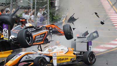 Sophia Floersch went over Sho Tsuboi's car while flying off the track at high speed on a tight right-hand bend on Lap 4. AP Photo