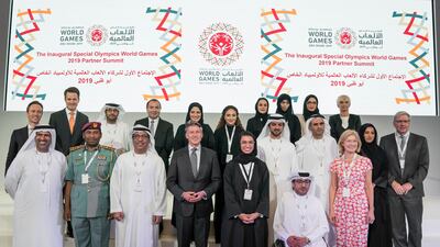 Noura Al Kaabi, centre, with Lord Sebastian Coe, centre left, and other Special Olympics sponsors and officials at a summit in Abu Dhabi on October 5, 2017.