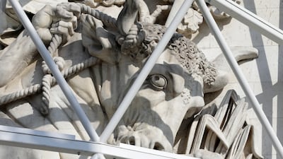 A sculpture of the Arc de Triomphe is protected during preparations for 'L'Arc de Triomphe, Wrapped'. AP