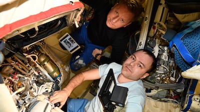 Mr Prokopyev and Mr Petelin aboard the International Space Station's Poisk module on December 9, 2022. Photo: Nasa