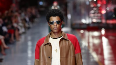 A model walks the runway at the fashion debut of the first co-ed Ferrari collection at Ferrari Factory on June 13, 2021 in Maranello, Italy. Getty Images