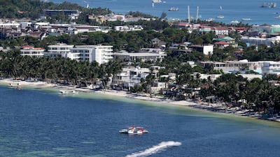 A lone jetski manoeuvres along the waters at the country's most famous beach resort island of Boracay. Aaron Favila / AP Photo