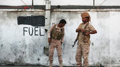 Soldiers stand guard in Mukalla. AP Photo