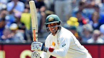 Australia's Usman Khawaja plays a shot against West Indies on Saturday during Day 1 of the second Test in Melbourne. William West / AFP / December 26, 2015