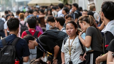 Students evacuate following an earthquake in Manila, Philippines, on Tuesday. Reuters