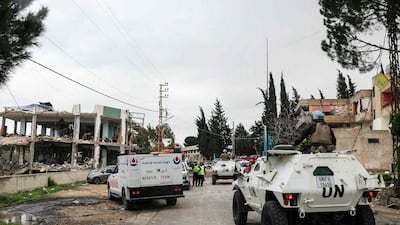Unifil personnel at the site of a healthcare centre destroyed by an Israeli strike on the southern Lebanese town of Burj Qalawiya. AFP