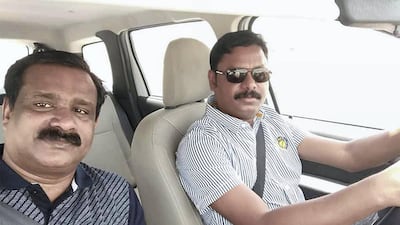 Jamaludeen Arakkaveettil, left, took this photo before boarding the bus from Muscat to Dubai. He died in the crash a few hours later and was the first victim to be repatriated to India.