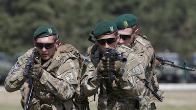 Ukrainian border guards take part in a training session at a camp of the State Border Guard Service in Kiev. Valentyn Ogirenko / Reuters