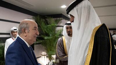 Algerian President Abdelmadjid Tebboune is received by Sheikh Tamim as the world football extravaganza kicks off in Doha. Qatar News Agency / Reuters