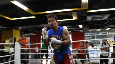 Manny Pacquiao announced on social media that he will fight Amir Khan in the UAE on April 23, but the boxer's promoter Bob Arum has said nothing has been finalised yet. Ted Aljibe / AFP