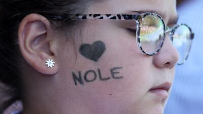A young fan attends an exhibition match played by Serbia's Novak Djokovic and Croatia's Ivan Dodig in Visoko, Bosnia. AP Photo