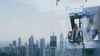 The Sky Views Glass Slide enables guests to glide down from level 53 to 52 in a transparent capsule.
