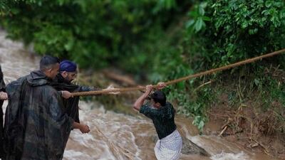 Indian military personnel conduct rescue operations in the flood affected areas in Belgaum/Belagavi district in North Karnataka, India. More than 80 have been killed in Kerala and Karnataka in flood-related incidents. EPA/INDIA INDIAN DEFENCE MINISTRY