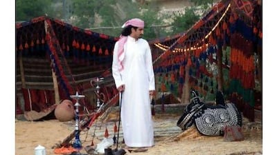 Omar bin Laden, the fourth son of Osama bin Laden, stands outside a tent on the outskirts of Cairo, on September 11, 2008, the anniversary of the 9/11 attacks.