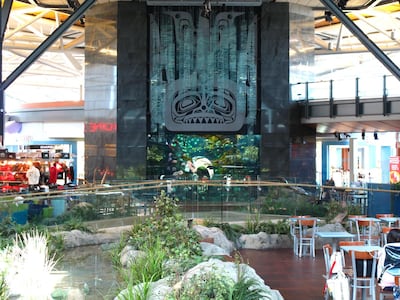 Animal lovers will enjoy transitting through Vancouver International Airport with it's in-terminal aquarium and cuddle-friendly therapy dogs. Courtesy Wikimedia Commons