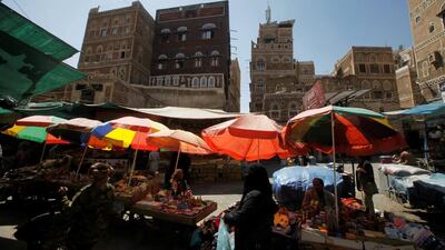 People walk in the old market in the historic city of Sanaa, Yemen. Mohamed al-Sayaghi / Reuters