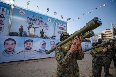 Fighters from militant group Palestinian Islamic Jihad attend a rally to commemorate the group's commanders and operatives killed during Israeli airstrikes in Gaza city. EPA