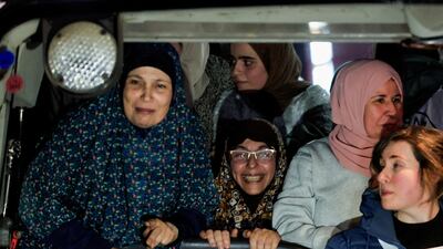 Palestinians freed from prisons are driven to freedom as part of a deal between Hamas and Israel, in Ramallah in the occupied West Bank. Reuters