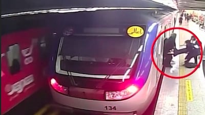 Armita Geravand is carried off a train in the Tehran Metro. Tehran Metro