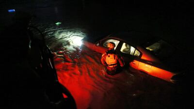 A rescue team from the local emergency management agency inspects flooded areas after the passing of Hurricane Irma on September 6, 2017 in Fajardo, Puerto Rico. Jose Jimenez / Getty Images