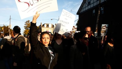 Marchers make their way to the Tree of Life synagogue. EPA