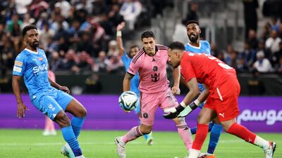 Inter Miami's Luis Suarez in action with Al Hilal's Habib Al Wotayan. Reuters
