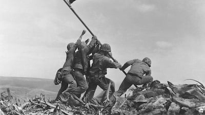 1945: Winner of the Pulitzer Prize for Photography for this photo, Joe Rosenthal captures US Marines raising the American flag over Mount Suribachi on the island of Iwo Jima in February 1945. The island witnessed one of the bloodiest battles of the Pacific War in the Second World War, resulting in the death of more than 6,000 soldiers. In the US, the photo became a symbol for triumph and was used as inspiration for the 1954 Marine Corps War Memorial in Arlington, Virginia. AP