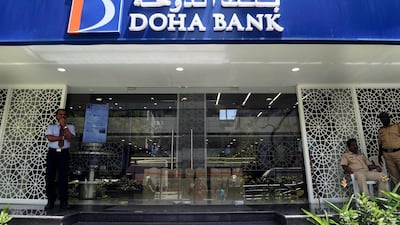 A group of refugees have accused Doha Bank, the largest private commercial bank in the state of Qatar, of allowing two individuals to use their accounts to fund a terror group. AFP PHOTO/ Indranil MUKHERJEE