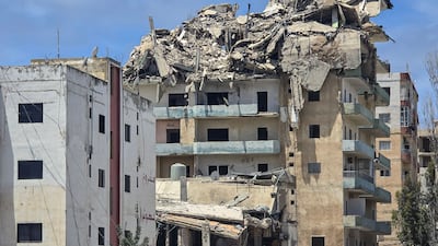 An Israeli strike damaged a building in the district of Tyre in southern Lebanon on May 19, 2026. AFP