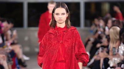 The house shade of fiery Valentino red, was worn head to toe, right down to the accessories