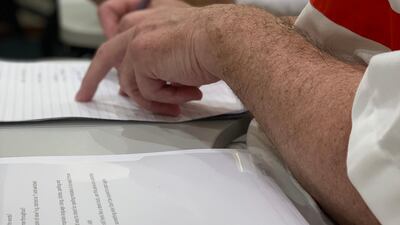 Inmates at Dubai prison working on their pieces for the novel. Courtesy Emirates Airline Festival of Literature