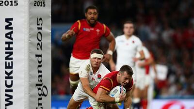 Gareth Davies of Wales goes over to score a try during the 2015 Rugby World Cup Pool A match between England and Wales at Twickenham Stadium on September 26, 2015 in London, United Kingdom. Paul Gilham / Getty Images