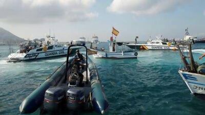 Spanish Civil Guard boats surround a fishing boat during a protest at the site where an artificial reef was built in Algeciras bay, La Linea de la Concepcion.