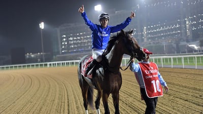 Christophe Soumillon celebrates after riding Thunder Snow to victory in the Dubai World Cup. Giuseppe Cacace / AFP