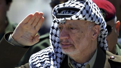 Palestinian President Yasser Arafat reviews an honour guard on his arrival at the Gaza Strip in this May 5, 2001 photo. Arafat died in France on November 11, 2004. Suhaib Salem / Reuters