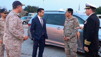 In this made available by the FBI, Saudi Arabia Defense Attaché Major General Fawaz Al Fawaz (second from right) meets with Saudi students at the NAS Pensacola base in Pensacola, Fla. AP