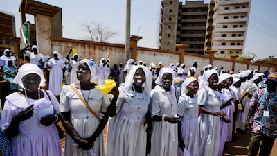 Nuns await the arrival of Pope Francis in Juba. AP