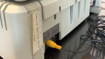 This sticker, complete with typo, shows just how old this Apple II is. Cody Combs / The National