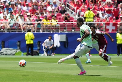 Switzerland's Breel Embolo scores from the penalty spot. Reuters