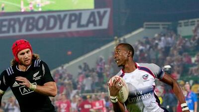 USA’s Perry Baker, right, scored two tries to lift his team past New Zealand and into Saturday’s quarter-finals. Victor Besa for The National