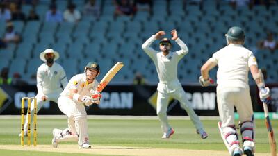 An emotional David Warner scored hundreds in both innings of the Adelaide Test of the 2014/15 series as Australia beat India in a tightly-contested game. Morne de Klerk / Getty Images