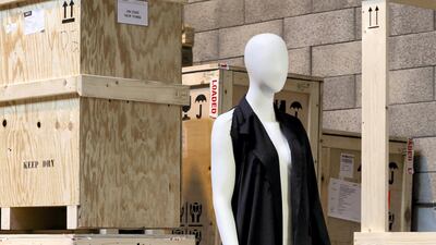 Martin Margiela, spring / summer 2006: A long coat made from a grey wool jacket with unfinished long panel at the back and left. Photo: Sotheby's