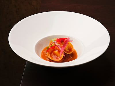 Tortellini with Gorgonzola dolce, served over smoked chicken makhani and chilli jam, is Tresind’s version of butter chicken. Photo: Tresind